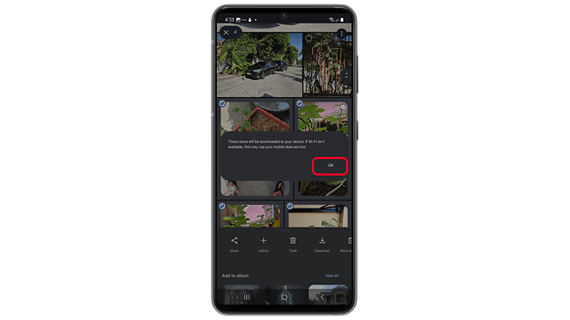 点击“继续”以确认在 Google Photos 中的批量下载。